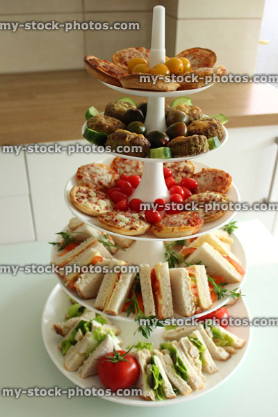 Stock image of afternoon tea, with sandwiches on tiered cake stand