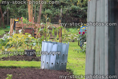 Stock image of plastic compost heap in allotment vegetable garden plot