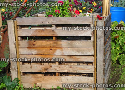 Stock image of wooden compost heaps, compost bin converters, allotment / vegetable garden waste