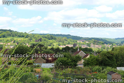 Stock image of allotment vegetable garden with raised beds, countryside setting