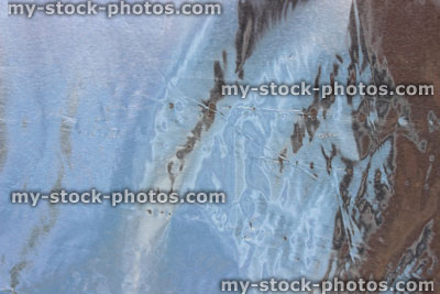 Stock image of crumpled aluminium foil background / wrinkled tin foil background