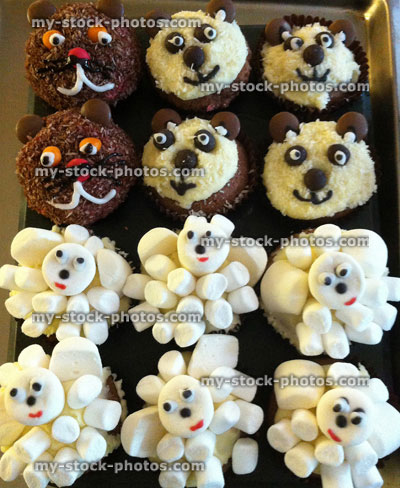 Stock image of homemade decorated animal cupcakes, dog, panda, sheep cakes