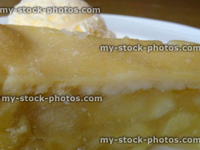 Stock image of homemade Bramley apple pie / ice cream dessert, apple tart slice