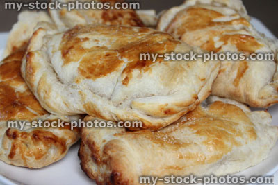 Stock image of homemade apple turnovers, butter puff pastry / pies / pasties