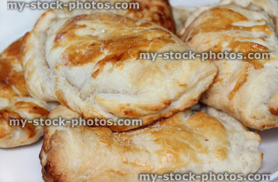 Stock image of homemade apple turnovers, butter puff pastry / pies / pasties