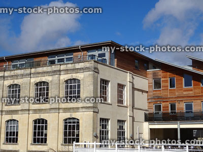 Stock image of historic and modern houses, old and new architecture