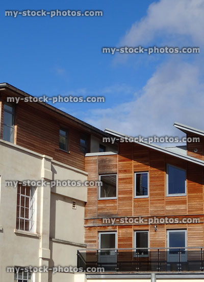 Stock image of contemporary architecture, modern houses with hardwood timber cladding exteriors