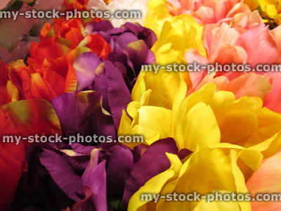 Stock image of artificial plastic / silk tulips / tulip flowers (red, yellow, pink, purple)