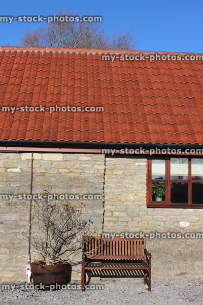 Stock image of barn conversion house / bungalow, converted stables / outbuildings, wooden windows, double glazing