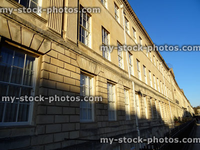 Stock image of Bath stone townhouses with historic Georgian facades / architecture
