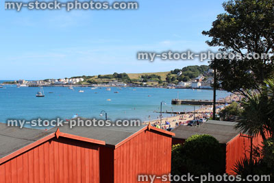 Stock image of beach huts at seaside resort, sea, sand, coastline