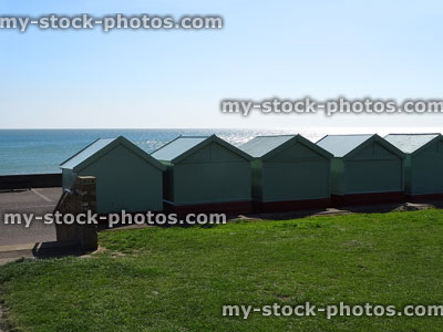 Stock image of beach huts and seafront promenade at Brighton seaside