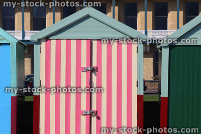 Stock image of pink stripes on beach hut at Brighton seaside promenade