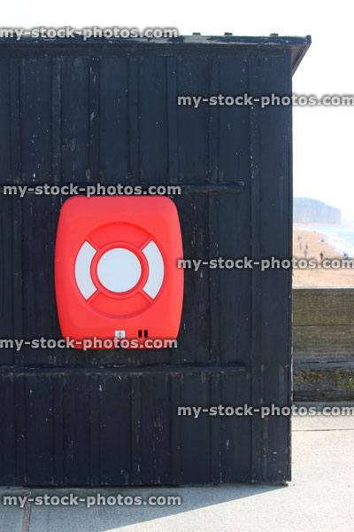 Stock image of lifering ring buoy / lifering lifesaver donut by beach