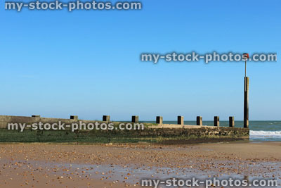 Stock image of sandy English beach in the summer, blue sky