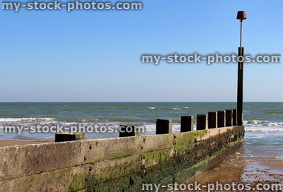 Stock image of typical wooden groyne on English beach, Bournemouth