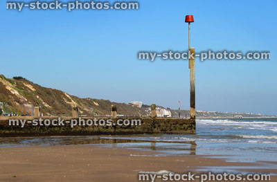 Stock image of coastline of Bournemouth beach, with cliffs and groynes