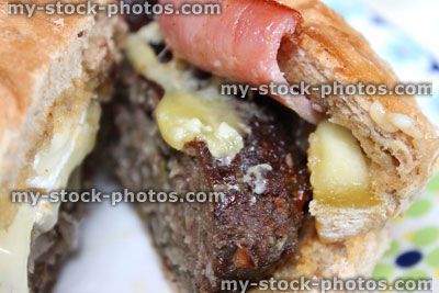 Stock image of homemade gourmet beef burger, cheese burger, stilton cheese, bacon, salad