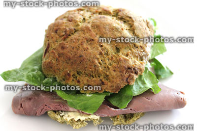 Stock image of beef sandwich with salad / lettuce, wholemeal bread roll