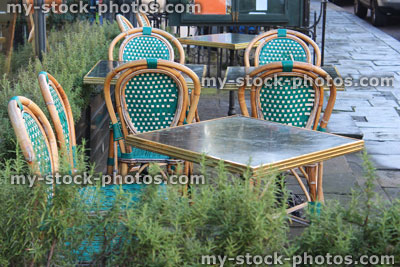 Stock image of French style, bistro bamboo cafe tables / chairs, al fresco dining