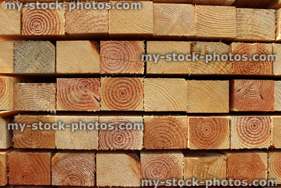 Stock image of square fence posts in pile at sawmill / timberyard