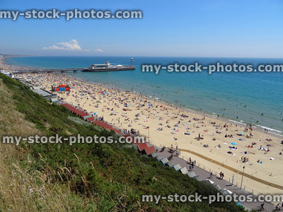 Stock image of Bournemouth beach seafront during summer holidays, aerial view