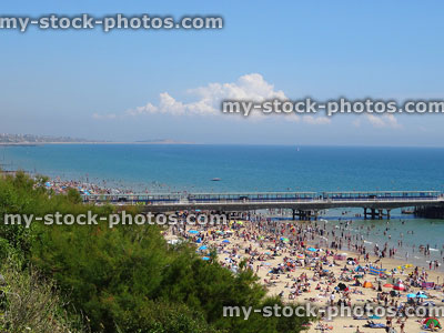 Stock image of Bournemouth beach, sea and pier during summer holidays