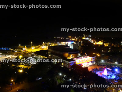 Stock image of night time skyline showing Bournemouth seafront, pier and theatre