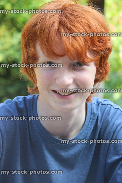Stock image of teenage boy portrait with short red / ginger hair
