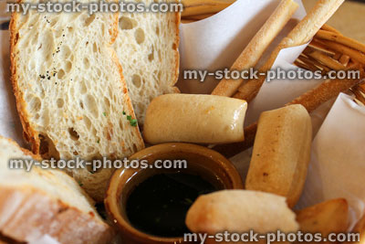 Stock image of bread basket in restaurant, with breadsticks 