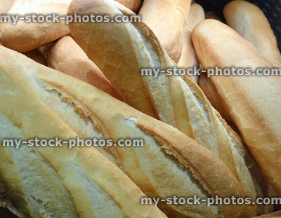 Stock image of freshly baked bread in bakery, French sticks / baguettes