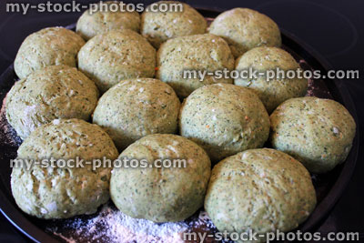 Stock image of wholemeal bread rolls proofing before being baked