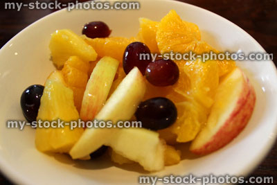 Stock image of bowl of fresh fruit salad, healthy breakfast alternative
