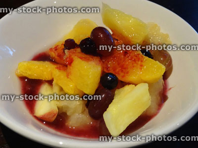 Stock image of fresh fruit salad bowl, healthy breakfast alternative, summer fruit, berries