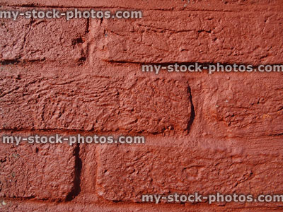 Stock image of brick wall that has been painted over, masonry paint