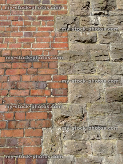 Stock image of historic red brick wall of house, looking upwards, different brickwork