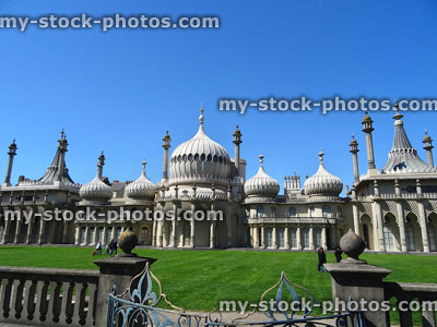 Stock image of Royal Pavilion in Brighton park, against blue sky