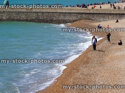 Stock image of Brighton beach with sea waves / tide lapping on-shore