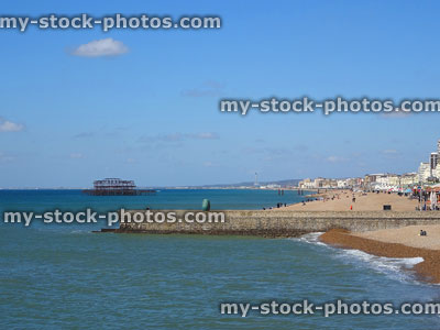 Stock image of Brighton beach, stone groyne sea defences, eroding coastline