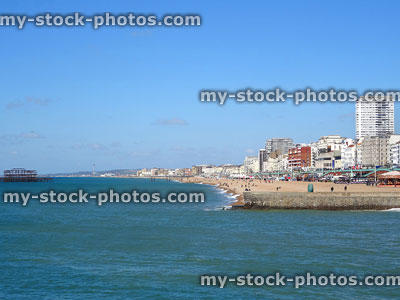 Stock image of Brighton beachfront, sea, blue-sky, hotels and old pier