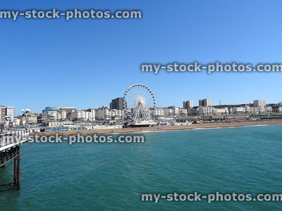 Stock image of Brighton pier, big wheel, beach and blue sea