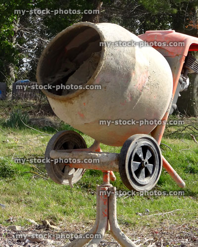 Stock image of concrete mixer on construction building site mixing cement