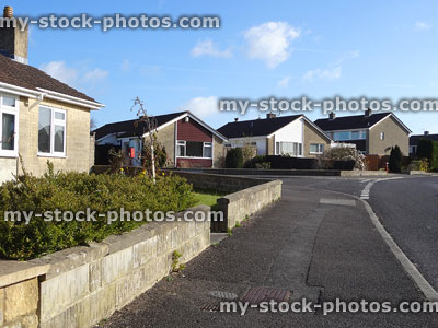 Stock image of housing estate with bungalows and houses, road / pavement