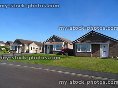Stock image of brick bungalows and single-storey houses built for retirement