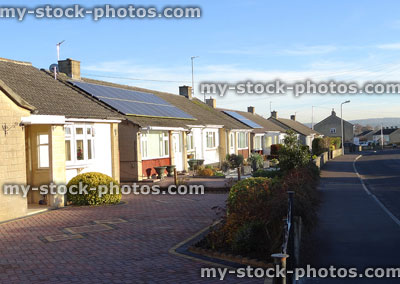 Stock image of row of single story bungalows, housing for the elderly
