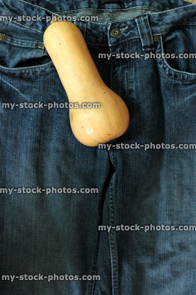 Stock image of butternut squash / fake penis and a pair of jeans (close up)