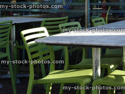 Stock image of pavement cafe tables and chairs outside (marble tabletops)