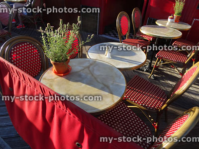 Stock image of French bistro cafe tables and chairs outside / alfresco dining