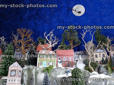 Stock image of printable card houses on scenic Christmas village mountains