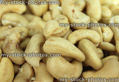 Stock image of cashew nuts / seeds, pile of cashews, healthy snack food